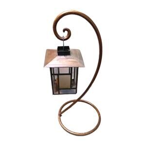 This is a Viva! Candle Lantern and Swing made in Mexico, Hand Crafted